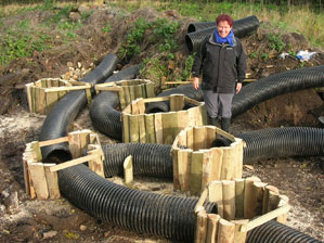 Artificial badger sett being created as part of set closure under license